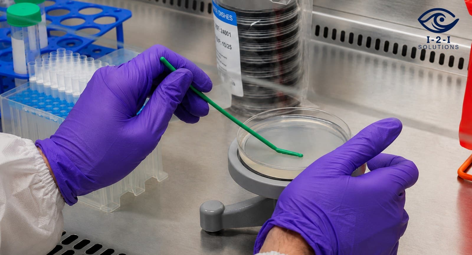 Laboratory technician performing SM 9215C dental water testing with R2A agar
